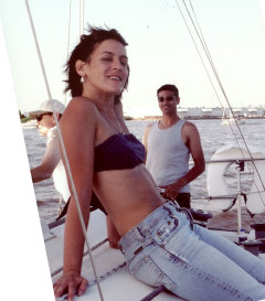 lady enjoying sailing on deck