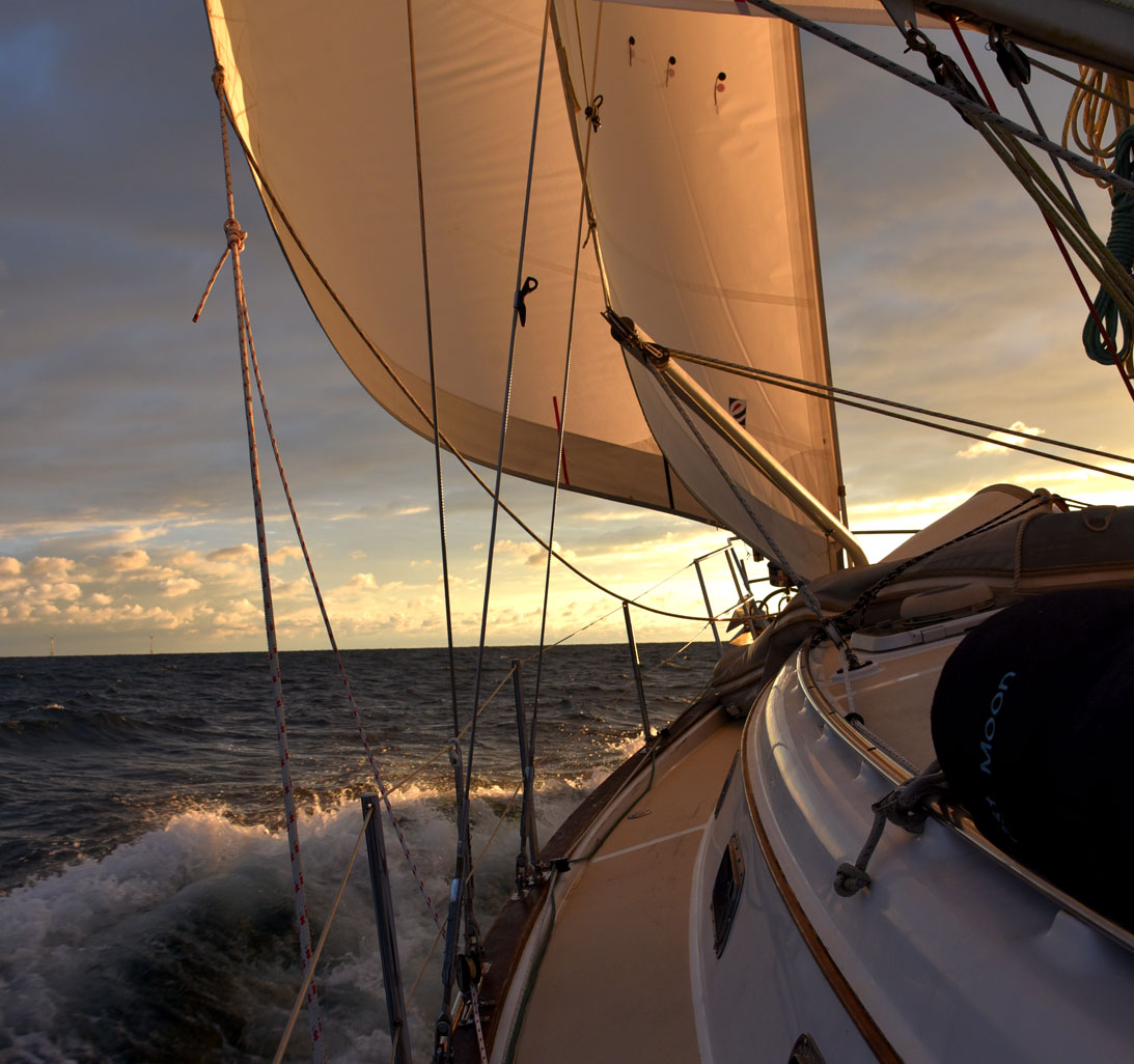 lee rail an jib sail at dusk